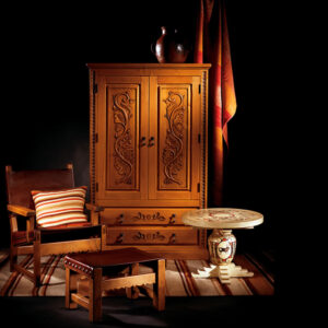 Vignette: Duquesa Acorn Trastero, Spanish Colonial Easy Chair, and Indian Pot End Table